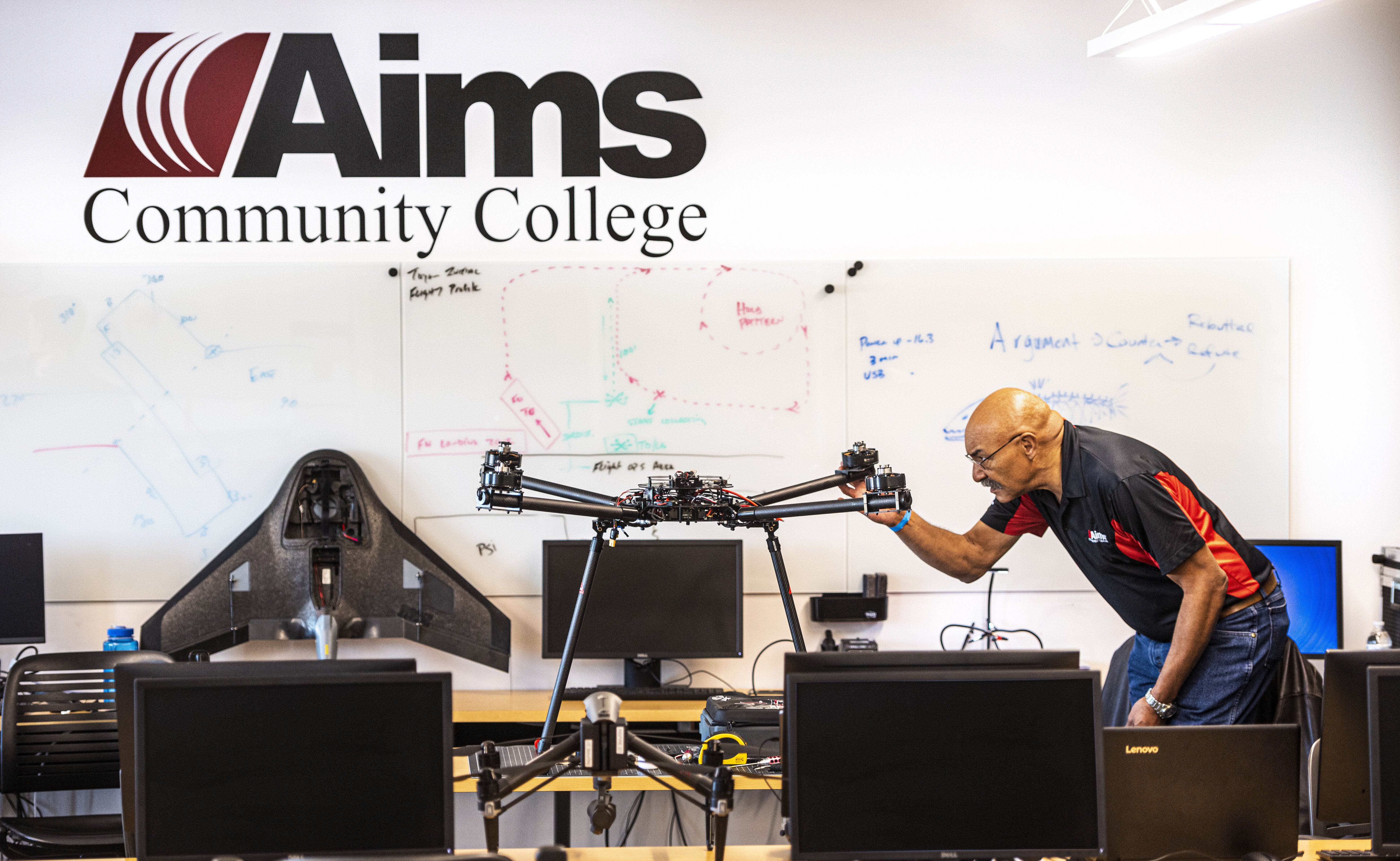 UAS (Drone) Program (2/21) Aims student working on a drone at the Windsor Campus