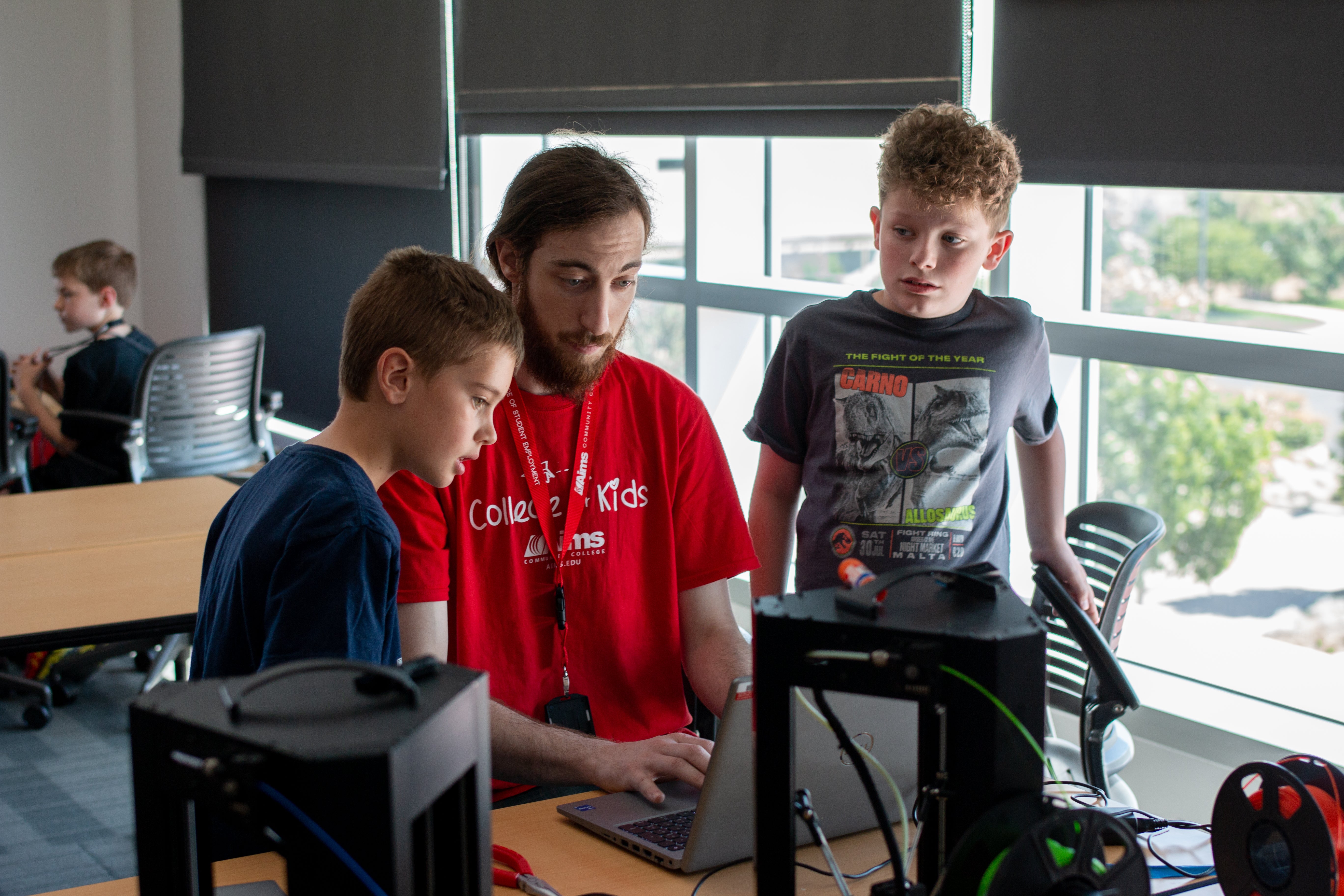 College for kids, two kids learn about machines
