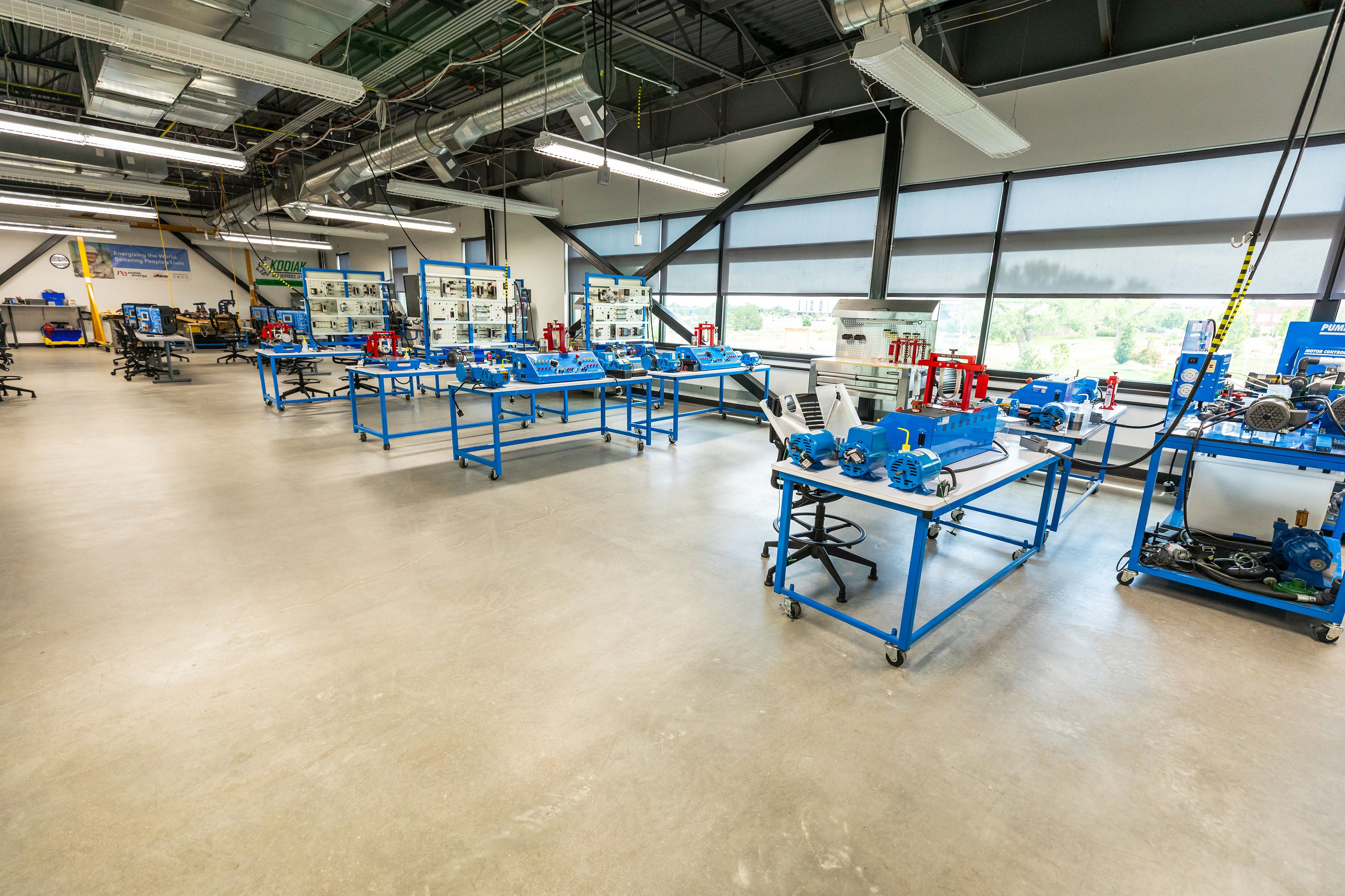 An interior photo of the Fluid Power Lab. Workstations for students to use.
