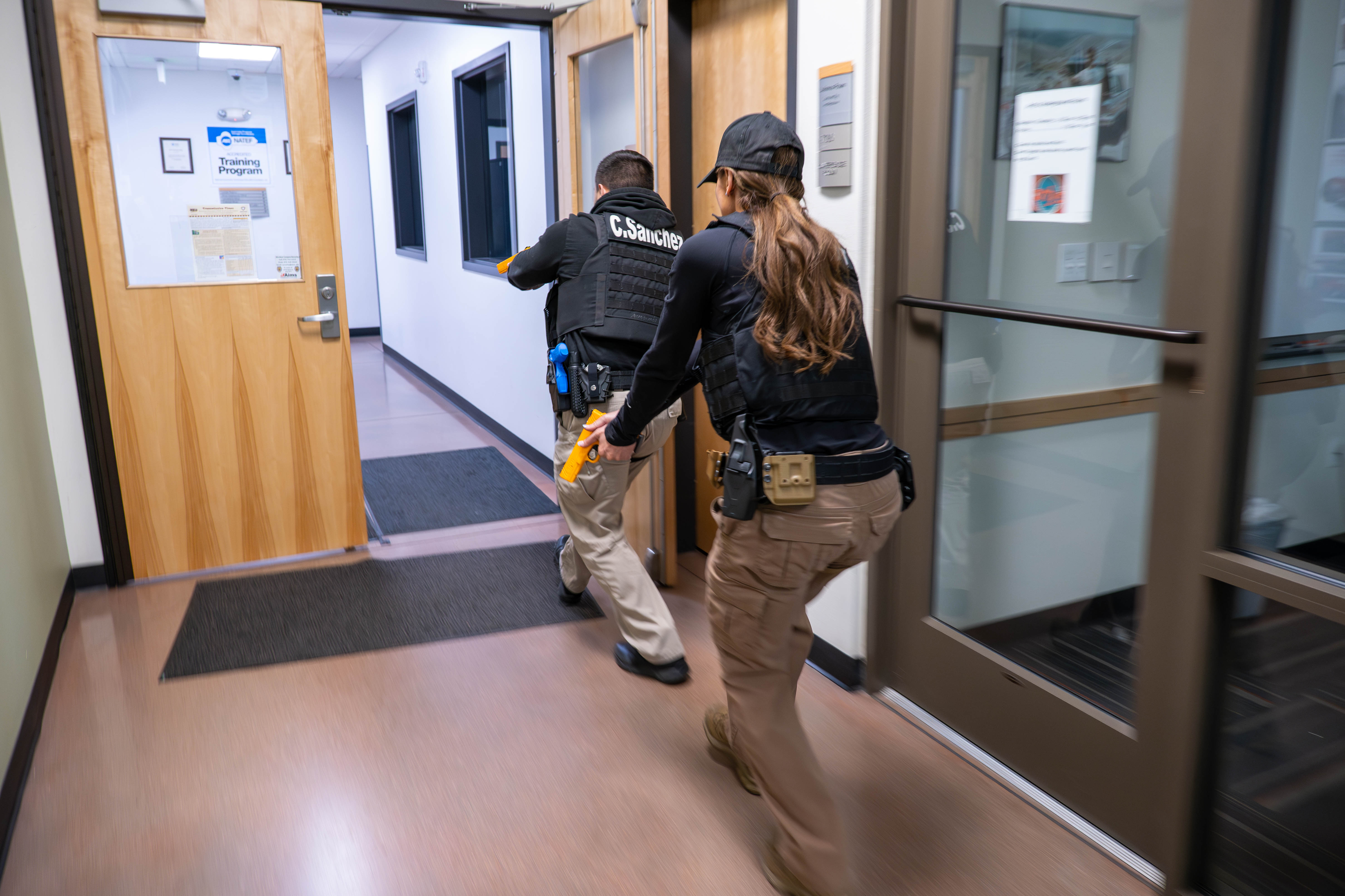 Aims Peace Officer Academy cadets practicing during an indoor active shooter drill