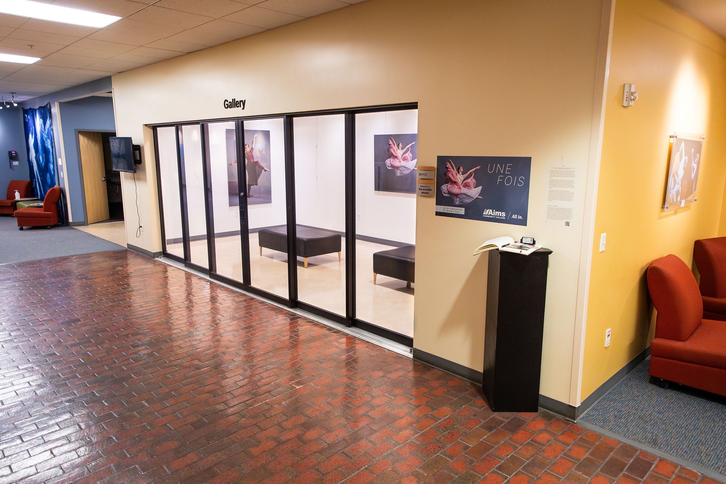 Exterior of the Ed Beaty Hall Art Gallery with sliding glass doors.