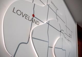 A map of Colorado in gray with the city of Loveland in focus
