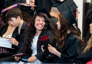 Aims spring 2022 graduates at commencement