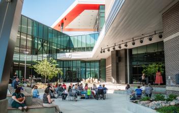 Students, faculty and guests gather for a summer music recital at the Aims Welcome Center