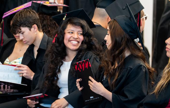 Aims spring 2022 graduates at commencement