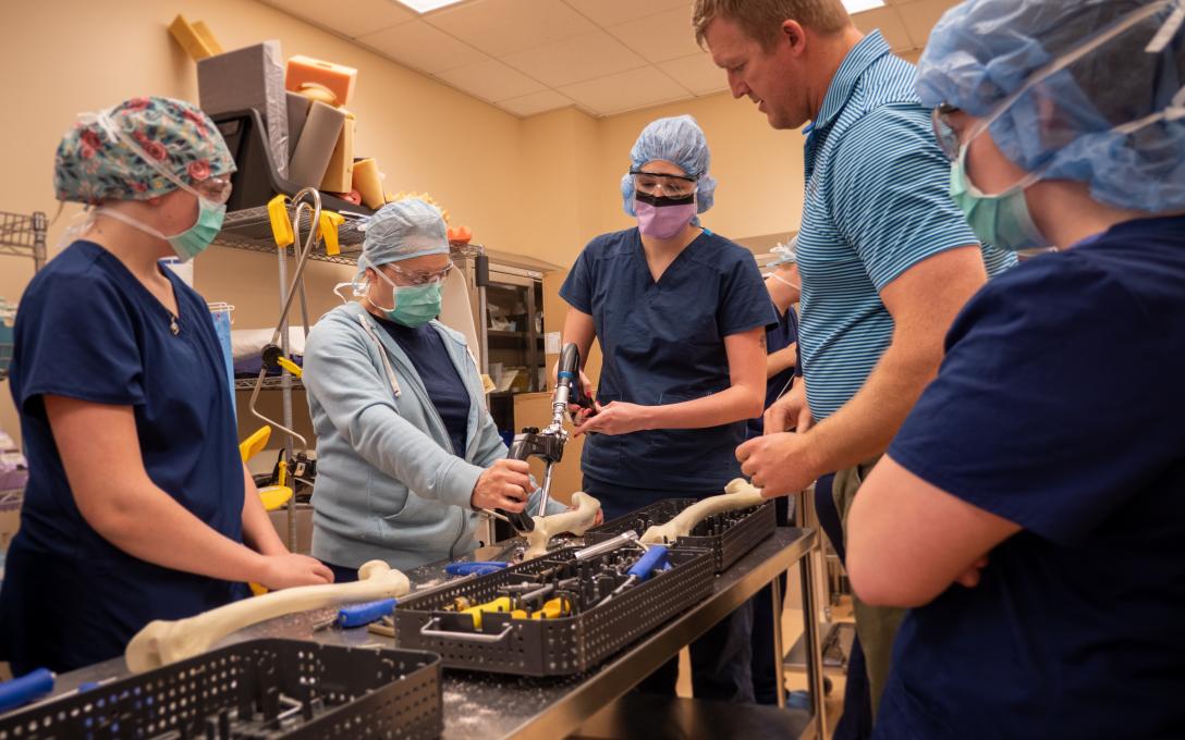Aims surgical technology associate degree students get hands-on experience practicing using surgical equipment.