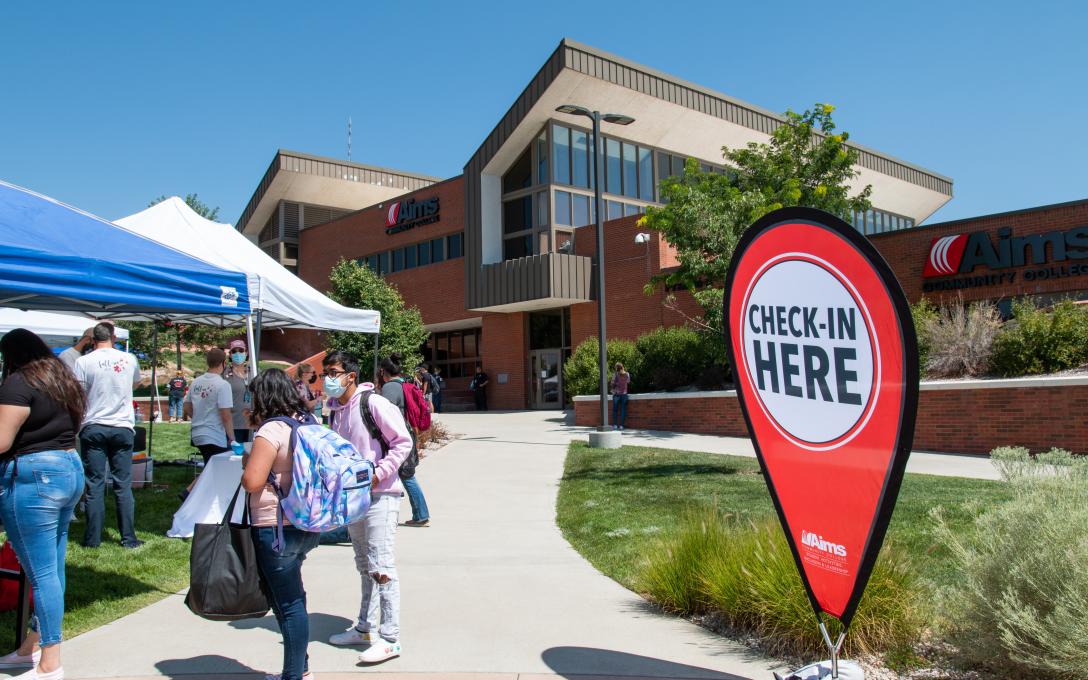 Students gathered outside at an event on the Aims Fort Lupton campus