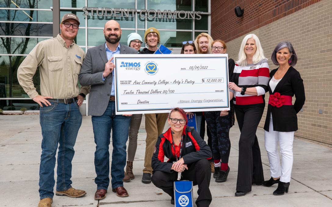 Artys pantry donation group photo