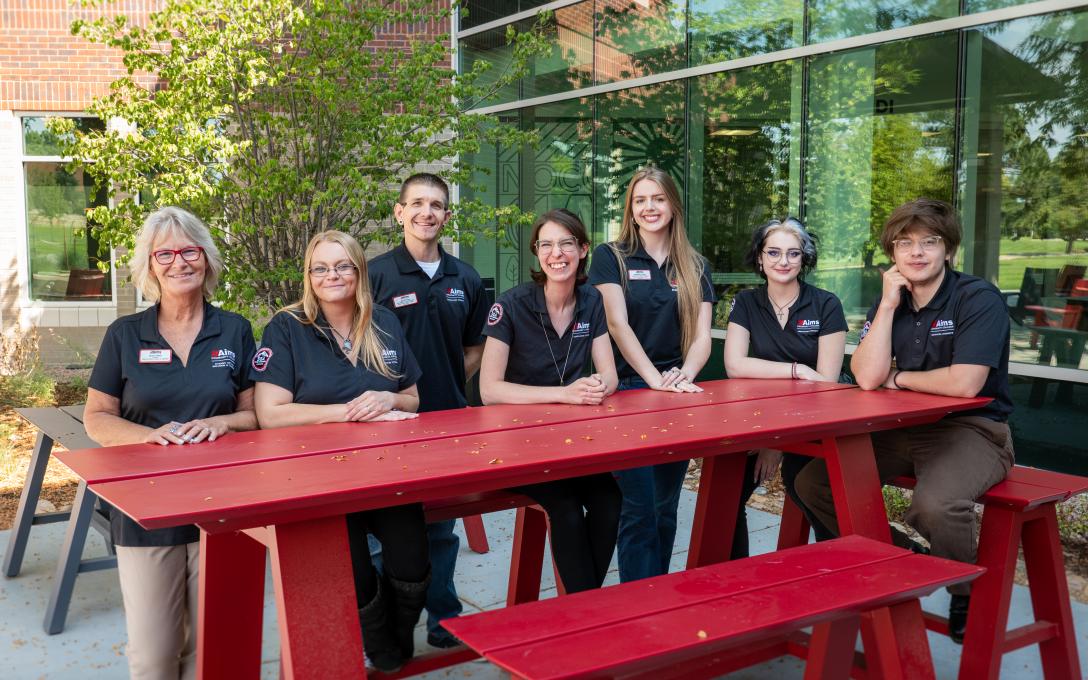 2022 Aims Student Government Association (SGA) members posing together outside the Student Commons on the Aims Greeley Campus