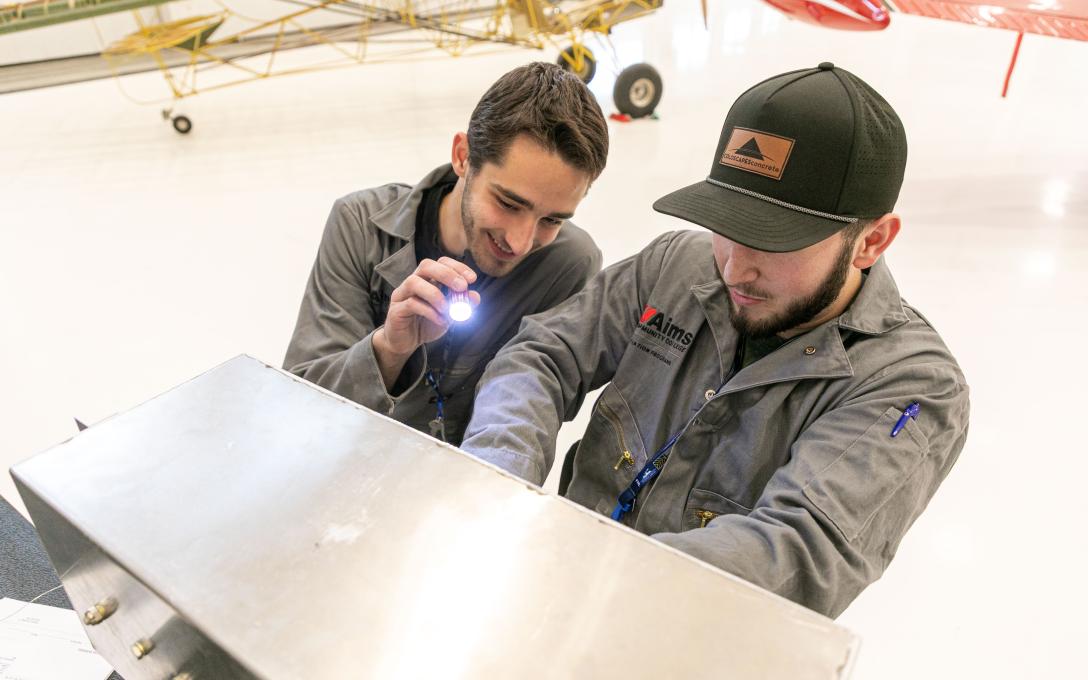 Aims AMT Students working on an Aircraft