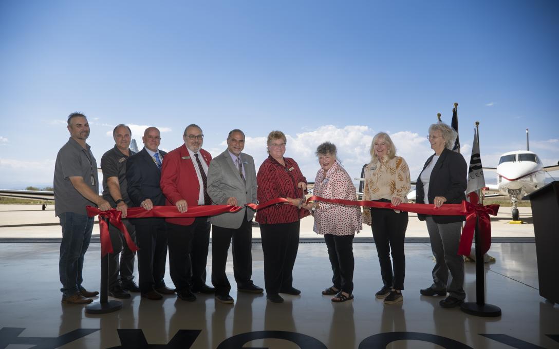 Aims employees and officials at AMTC ribbon cutting