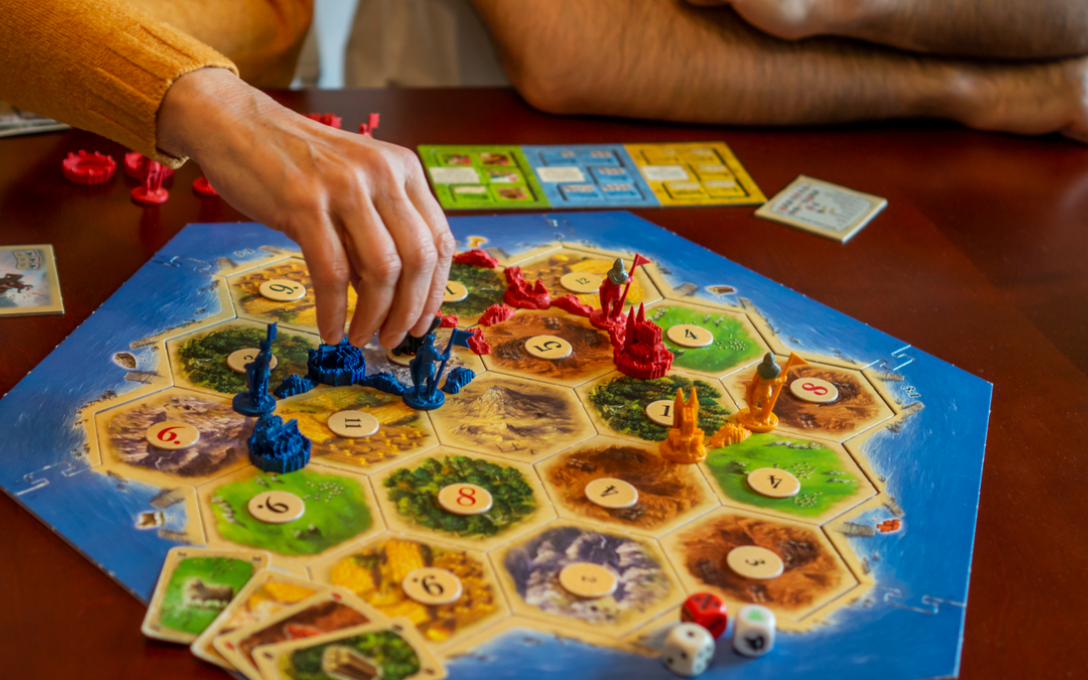 Board game being played