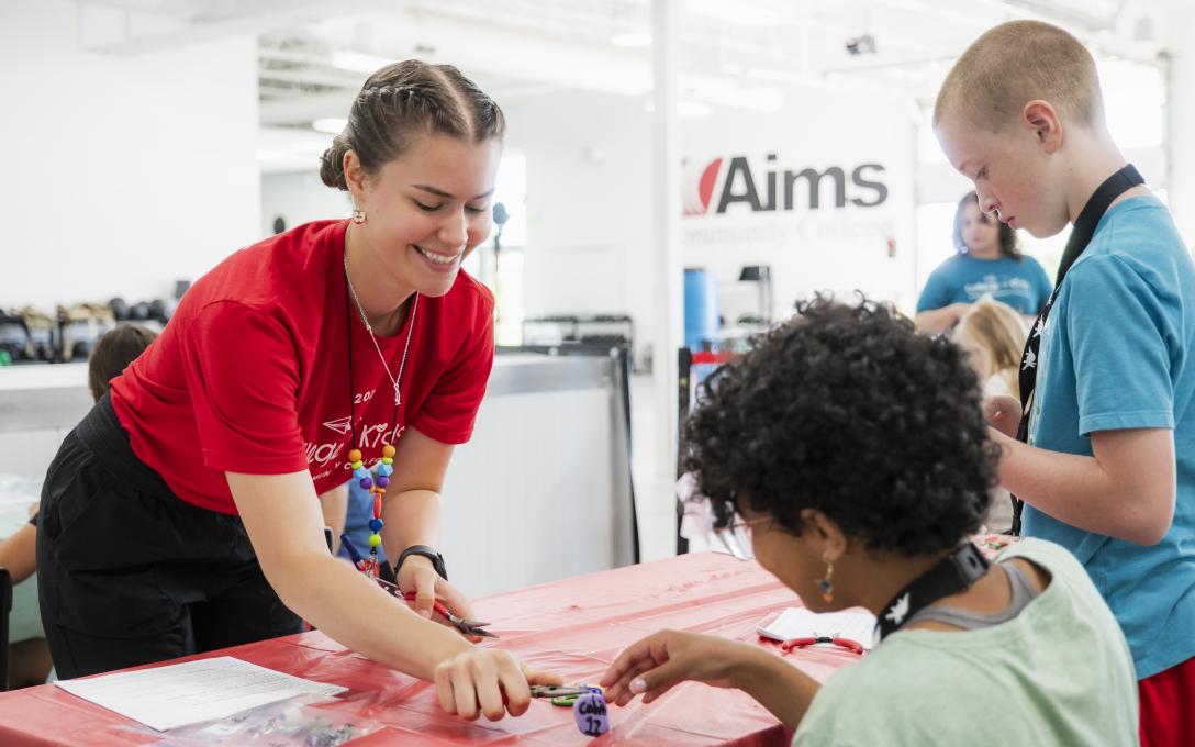 Teach and students at College for Kids