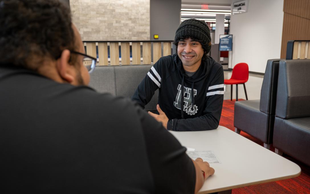 Advisor working with student