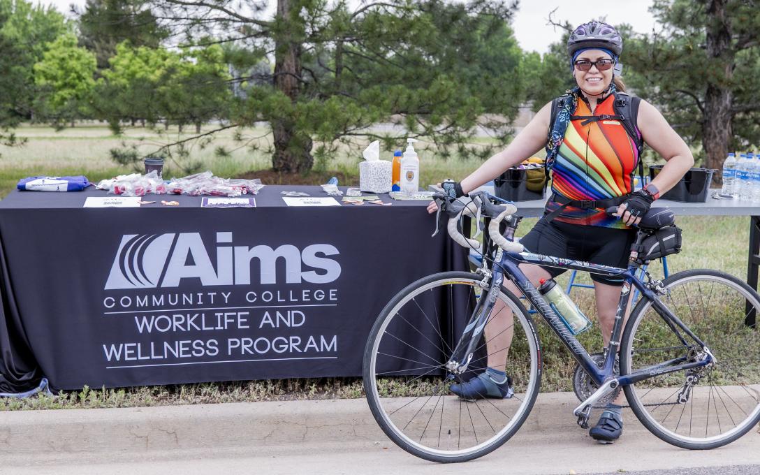 Woman on bike at Let's Bike Day at Aims