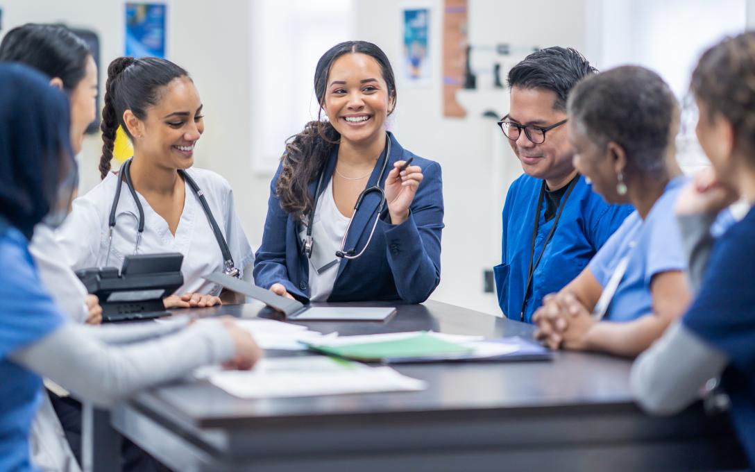 several medical professionals at a table