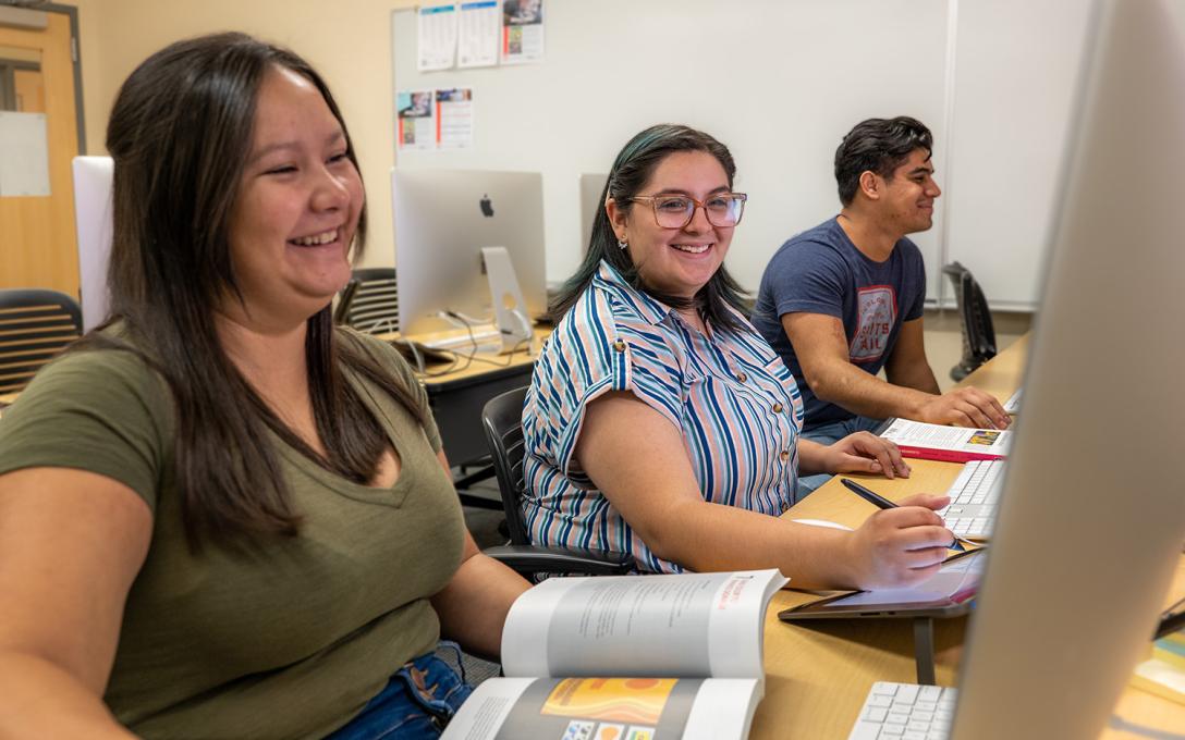 Aims Community College students in a classroom with computers