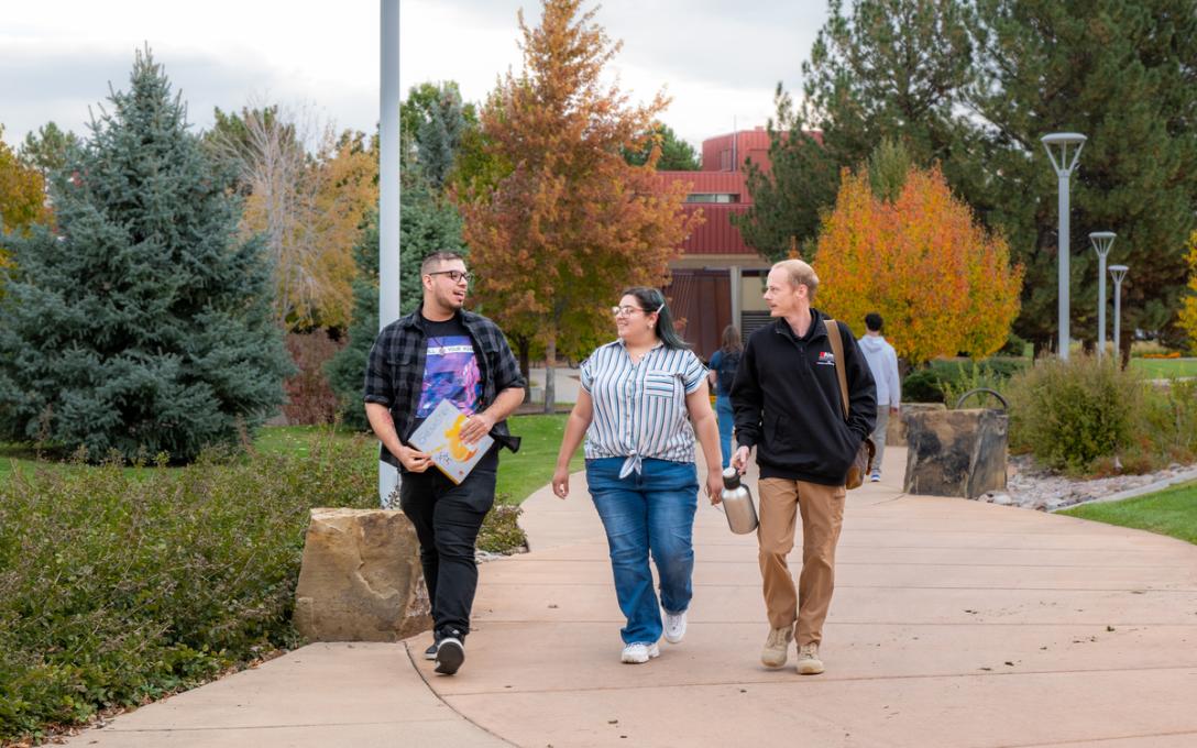 Students walking across Greeley Aims campus