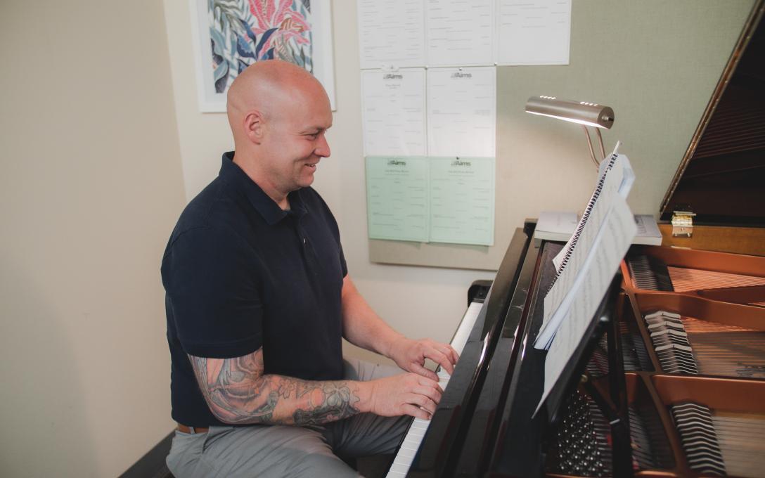 Ty playing the piano