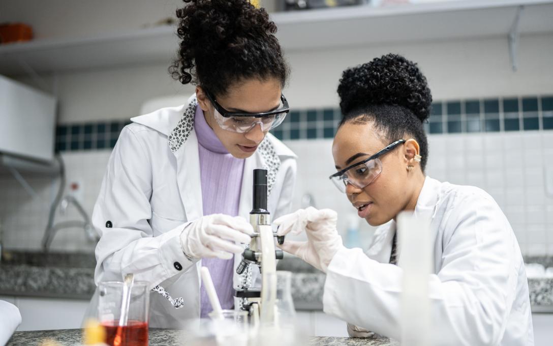 Two science students working together in a lab