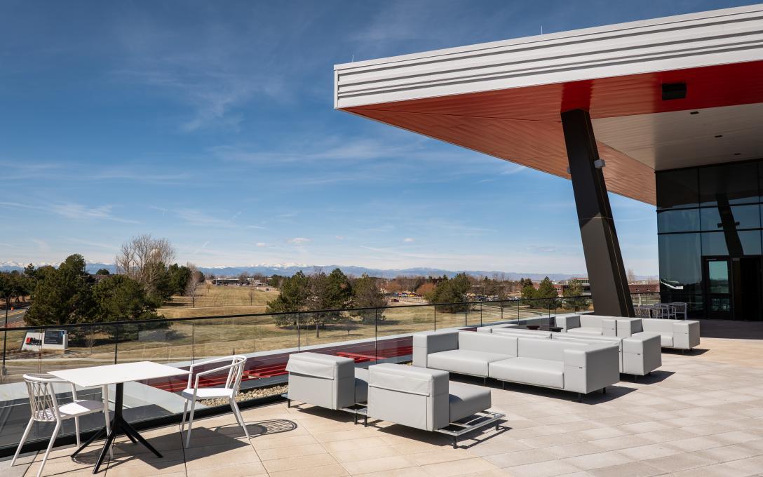 Aims Welcome Center rooftop sky deck patio with couches and chairs for comfortable seating