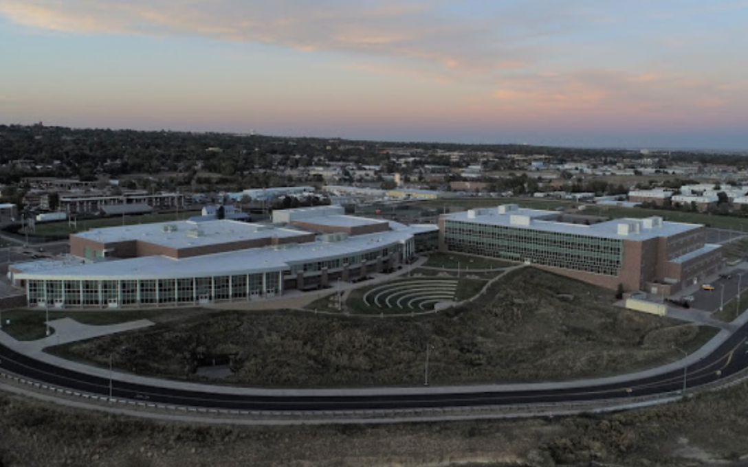Aerial shot of Westminster high with pink sunset
