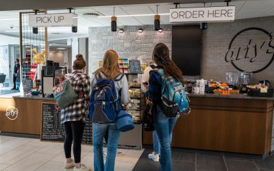 Students ordering coffee at Arty's Coffee Bar