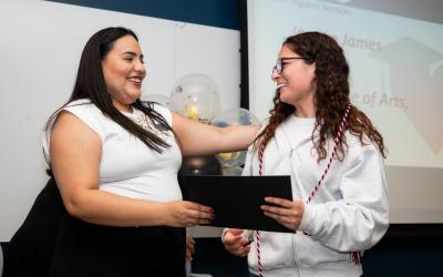 Women giving another woman an award