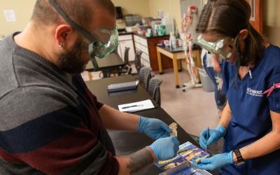 Aims Community College students in a biology lab class