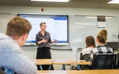 An Aims Career Services team member leading a classroom discussion