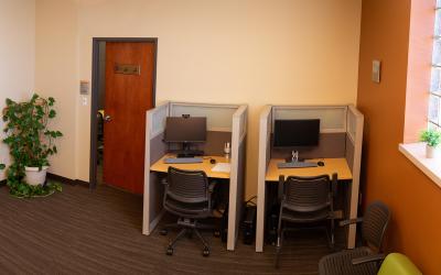 The inside of the testing center at the Loveland campus has computers and monitoring equipment for a secure testing environment.