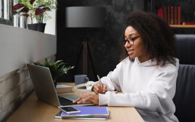 Online learning student working on laptop