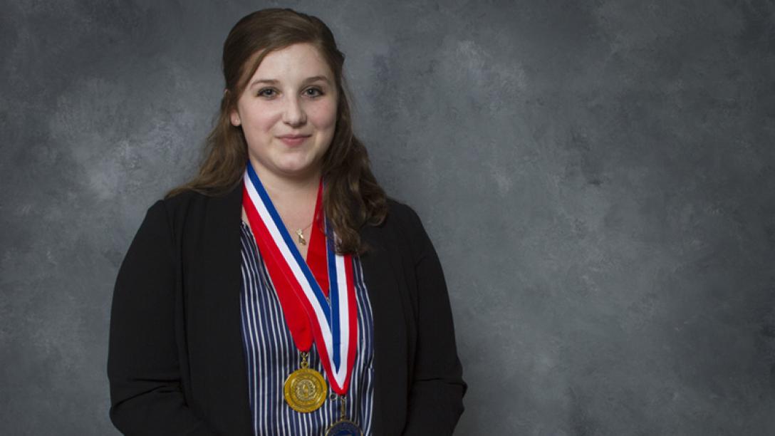 Hannah Sullivan with her Coca Cola award.