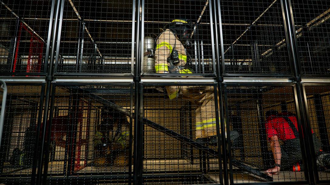 Fire training maze with student in bunker gear inside