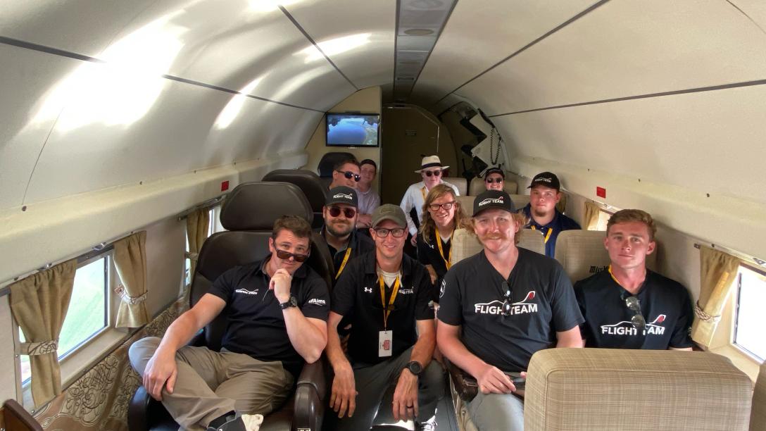 Aims Flight team in plane