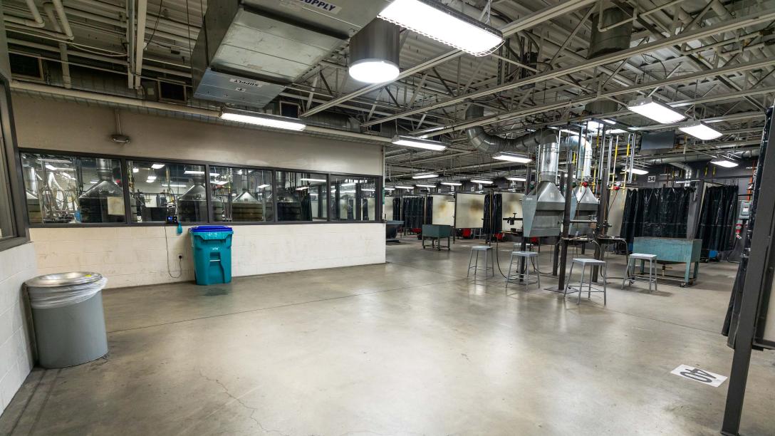 Interior photo of the Welding Lab. Work spaces for welding students to work on projects.