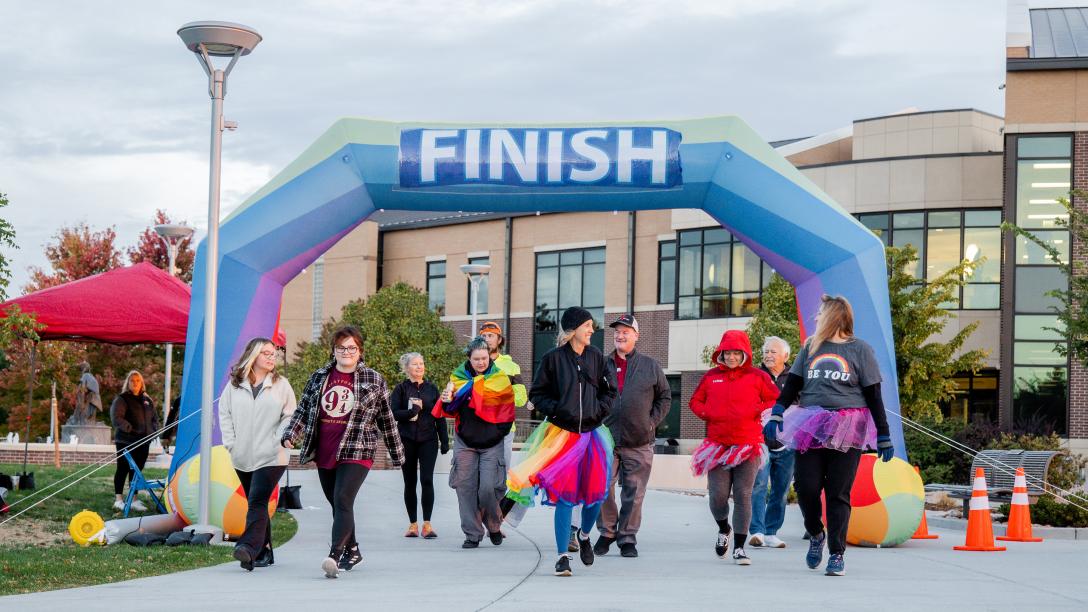 LGBTQ+ fun run partisipants at the finish line
