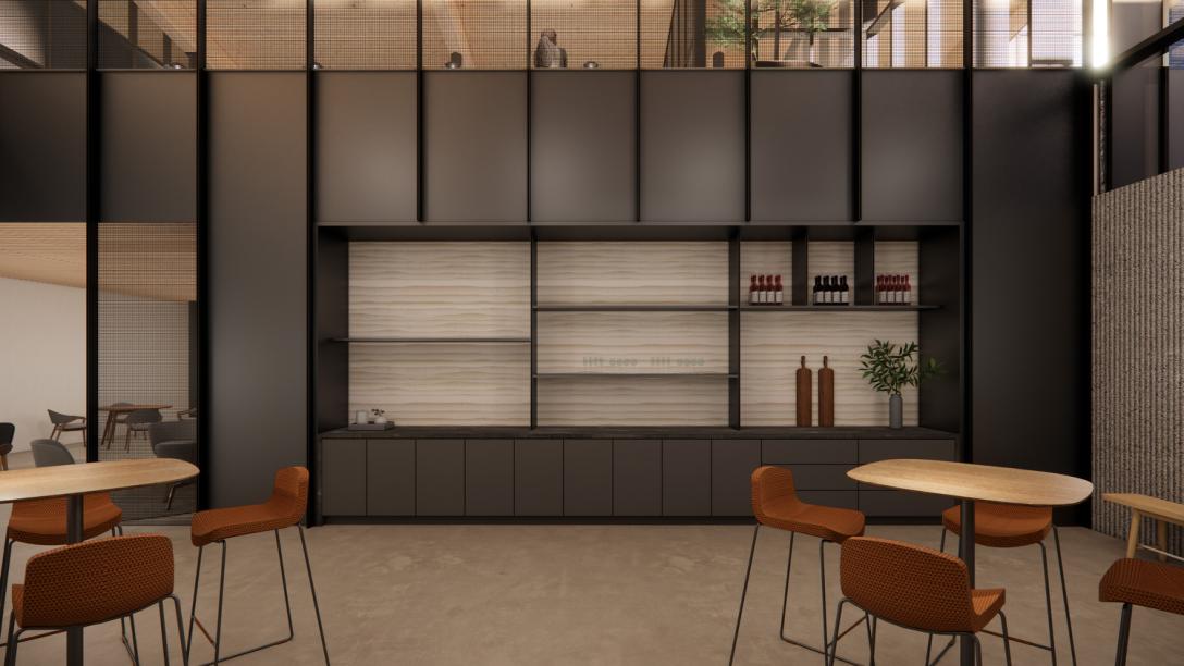An interior rendering of an open, airy lounge area featuring curved, rust-colored modular couches and small round tables. Extensive floor-to-ceiling windows provide a clear view of the grassy campus exterior.