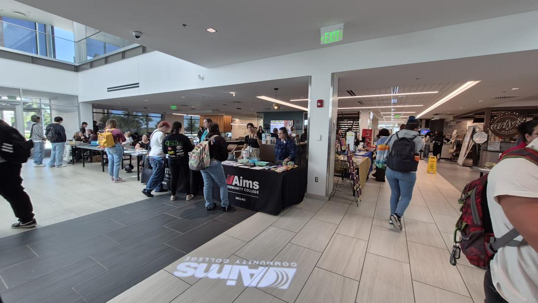 Students visiting club tables at Club Rush