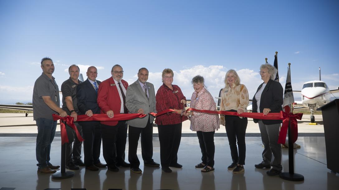 Aims employees and officials at AMTC ribbon cutting