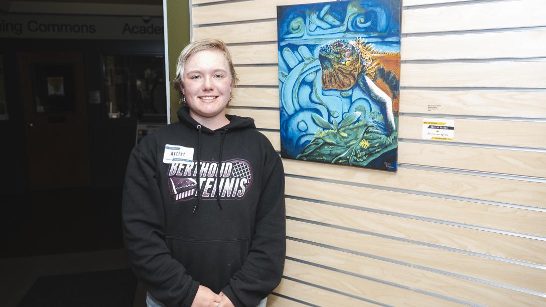 Aims student winner for Best Use of Color Addison Kapaun for Dreamscape Iguana and Eternal Huntress