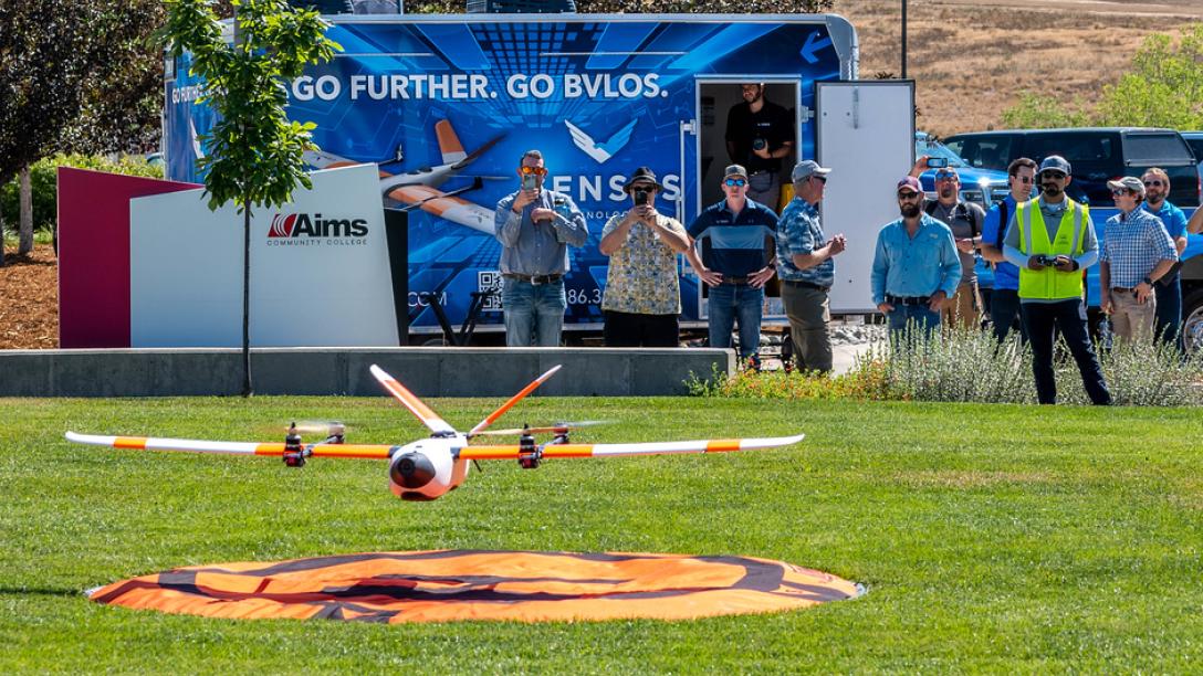 Spectators watching Sentaero BVLOS unmanned aerial system drone take flight