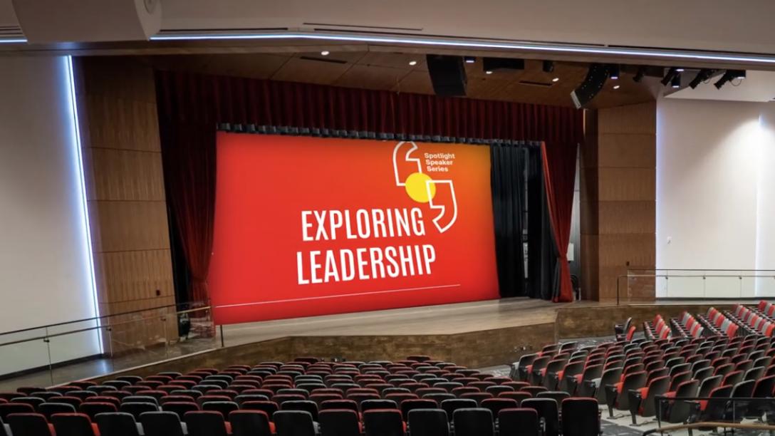 Aims Welcome Center Miller Auditorum with Exploring Leadership on the Screen