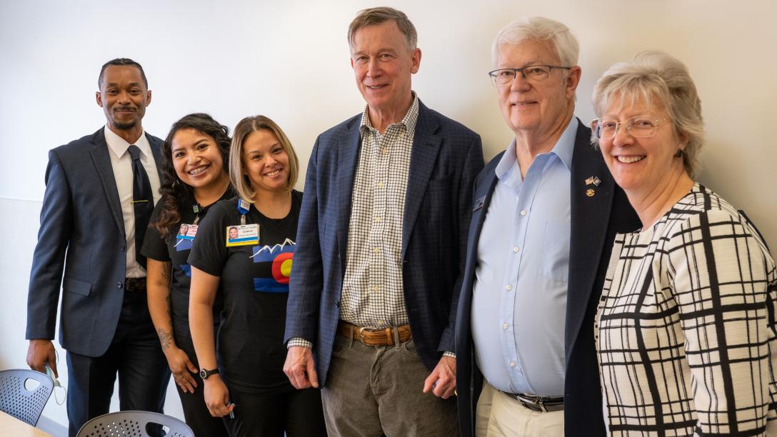 Sen. John Hickenlooper with Aims leadership and students