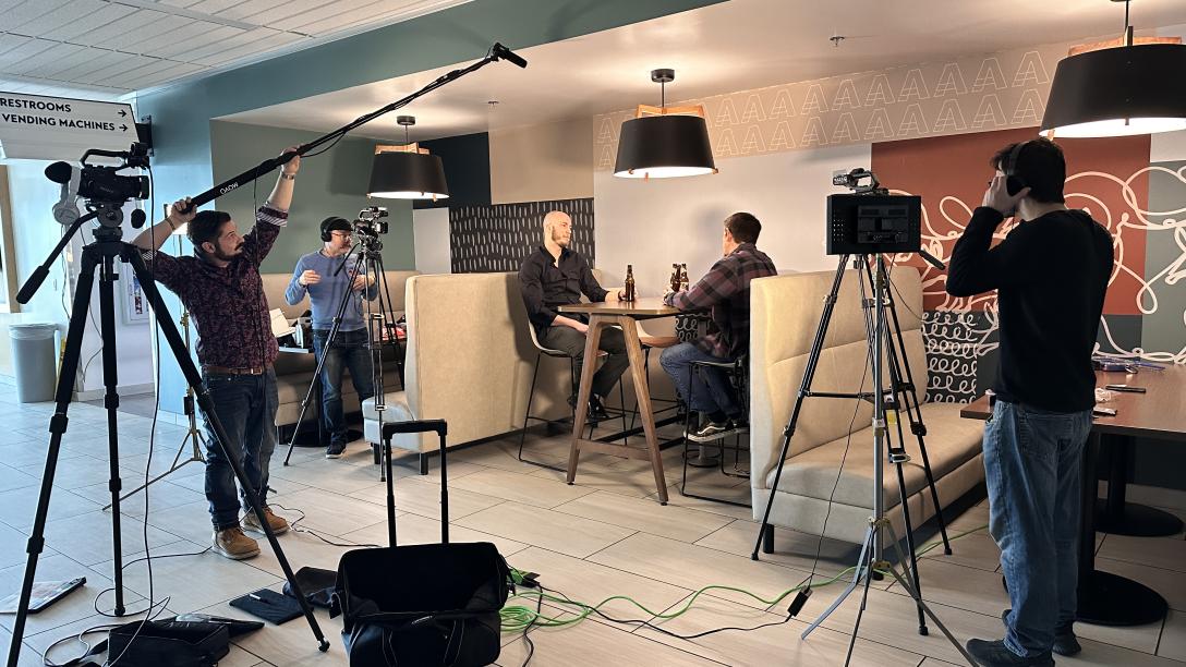 Film crew in with cameras creating a movie at Aims
