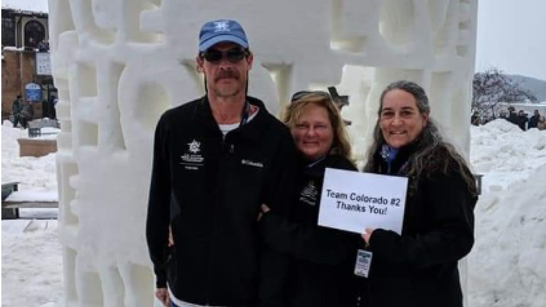 Carrie Thompson with two people