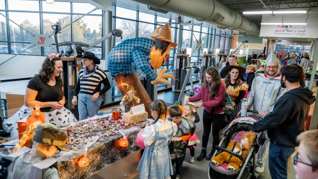 Families and students at Trick or Treat Track event