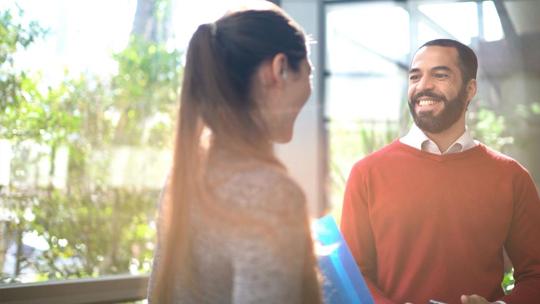 An Aims enrollment navigator helping a student