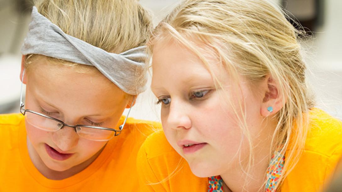 Young girls participating in College for Kids program