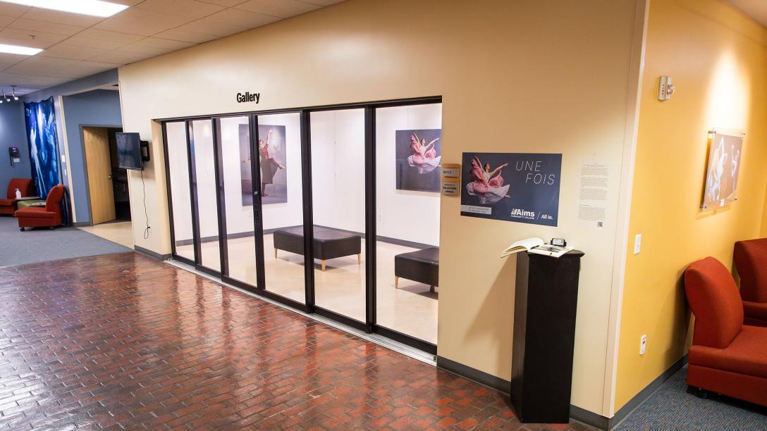Exterior of the Ed Beaty Hall Art Gallery with sliding glass doors.